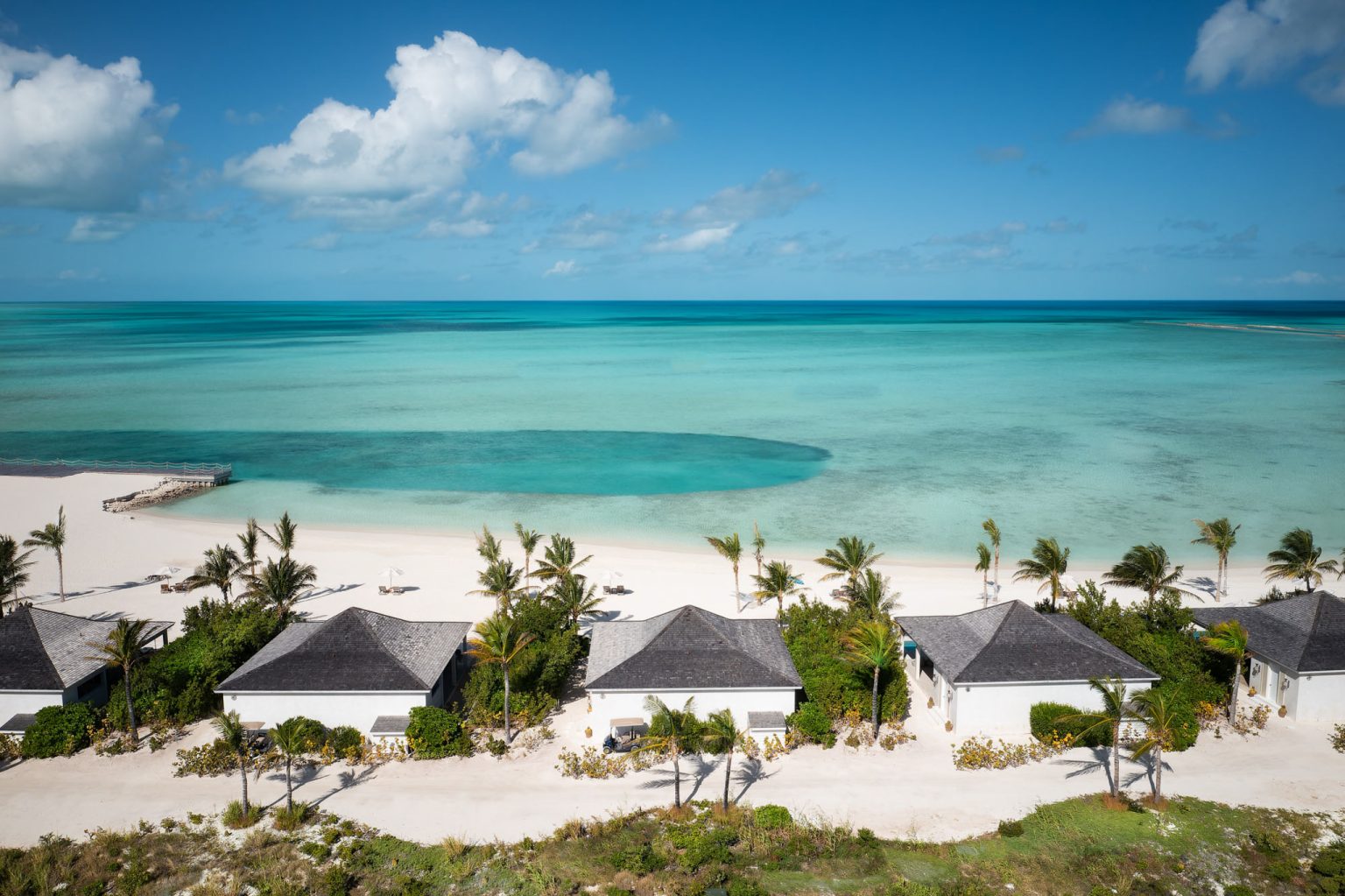644a08822cdf8304c25c1128_Ambergris Cay All Inclusive Resort Monck Beach Aerial Shot 2