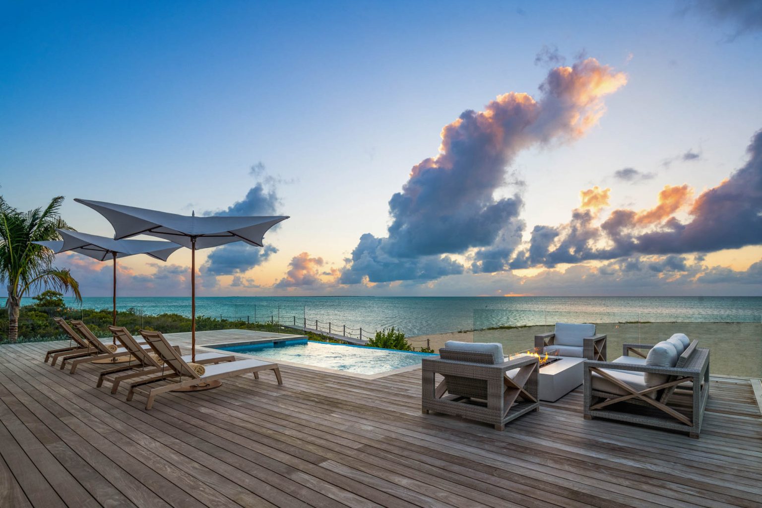 6633aa7745c521d550c2556b_10-ambergris-cay-sunsetpoint-2-bedroom-bungalow-sunset-3000px