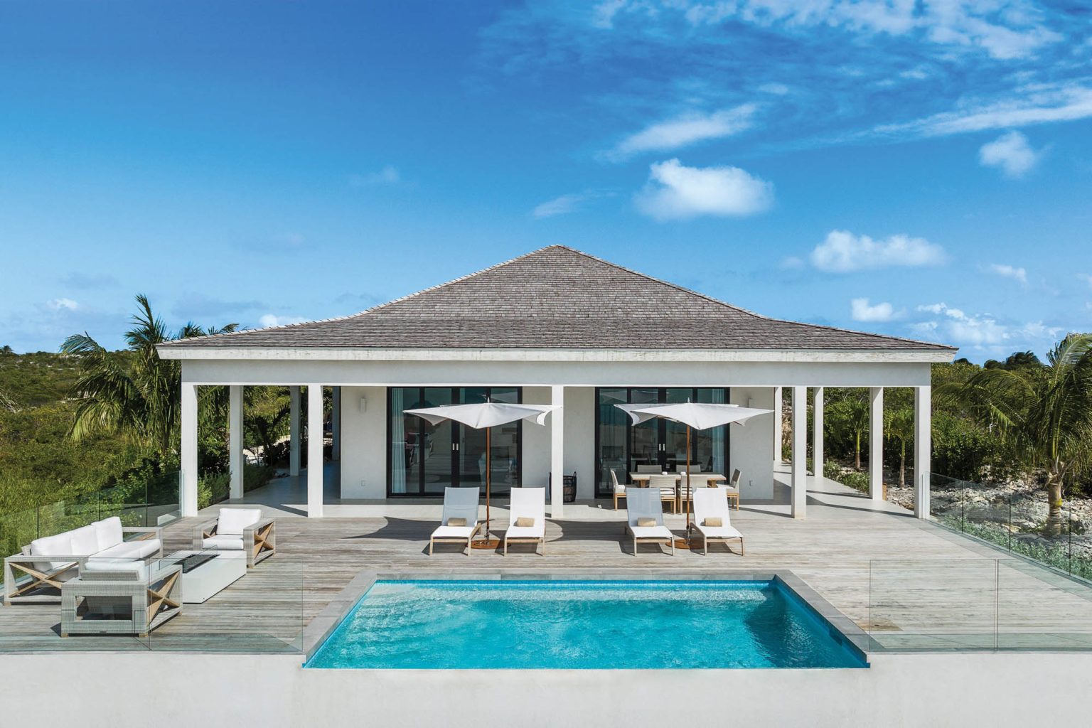 6633aa77e9968889efbe87e3_01-ambergris-cay-sunsetpoint-2-bedroom-bungalow-exterior-3000px