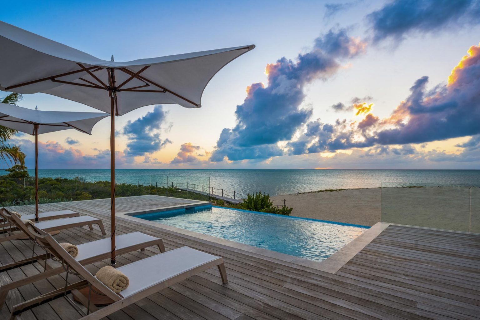 6633b1a6c700f1d66d337696_ambergris-cay-sunsetpoint-2-bedroom-bungalow-pool-3000px