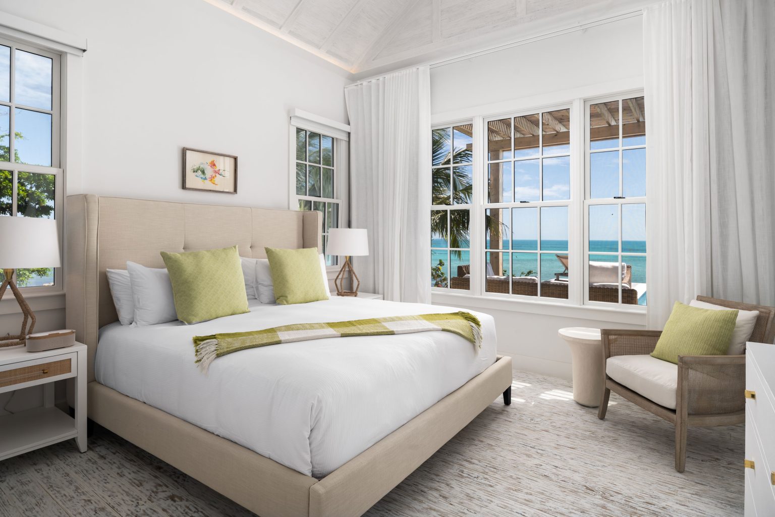 66a26e2b42739b7c868267c1_04-ambergris-cay-puesta-del-sol-villa-bedroom3-3000px