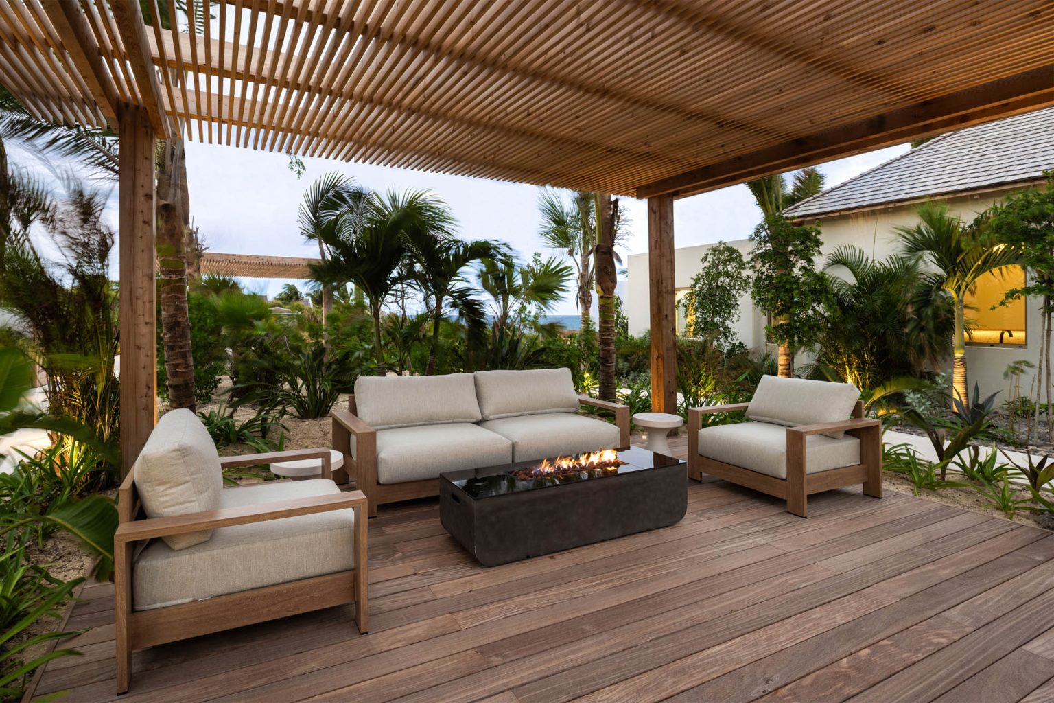 678054015923b3021494b2ee_Ambergris-Cay-Dream-Estate-Away-Villa-Fire-Pit-Seating-Area