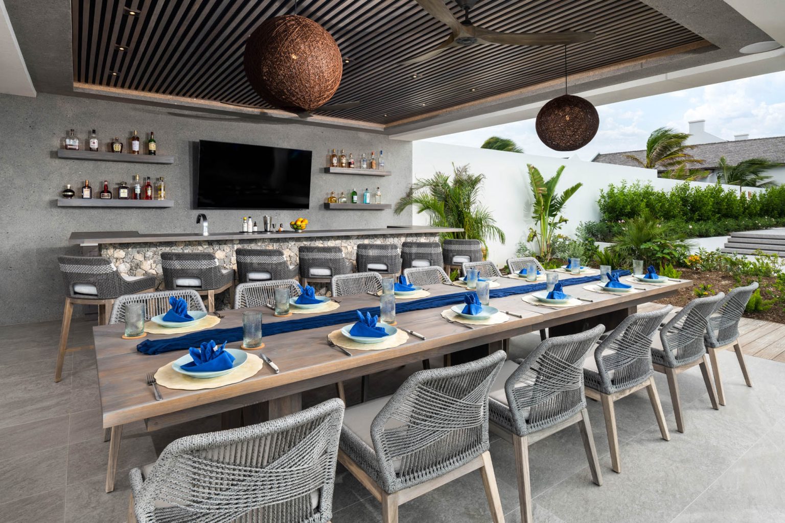 67805a0c1b3176aca3eba1c3_Ambergris-Cay-Dream-Away-Villa-Dining-Area-and-Bar