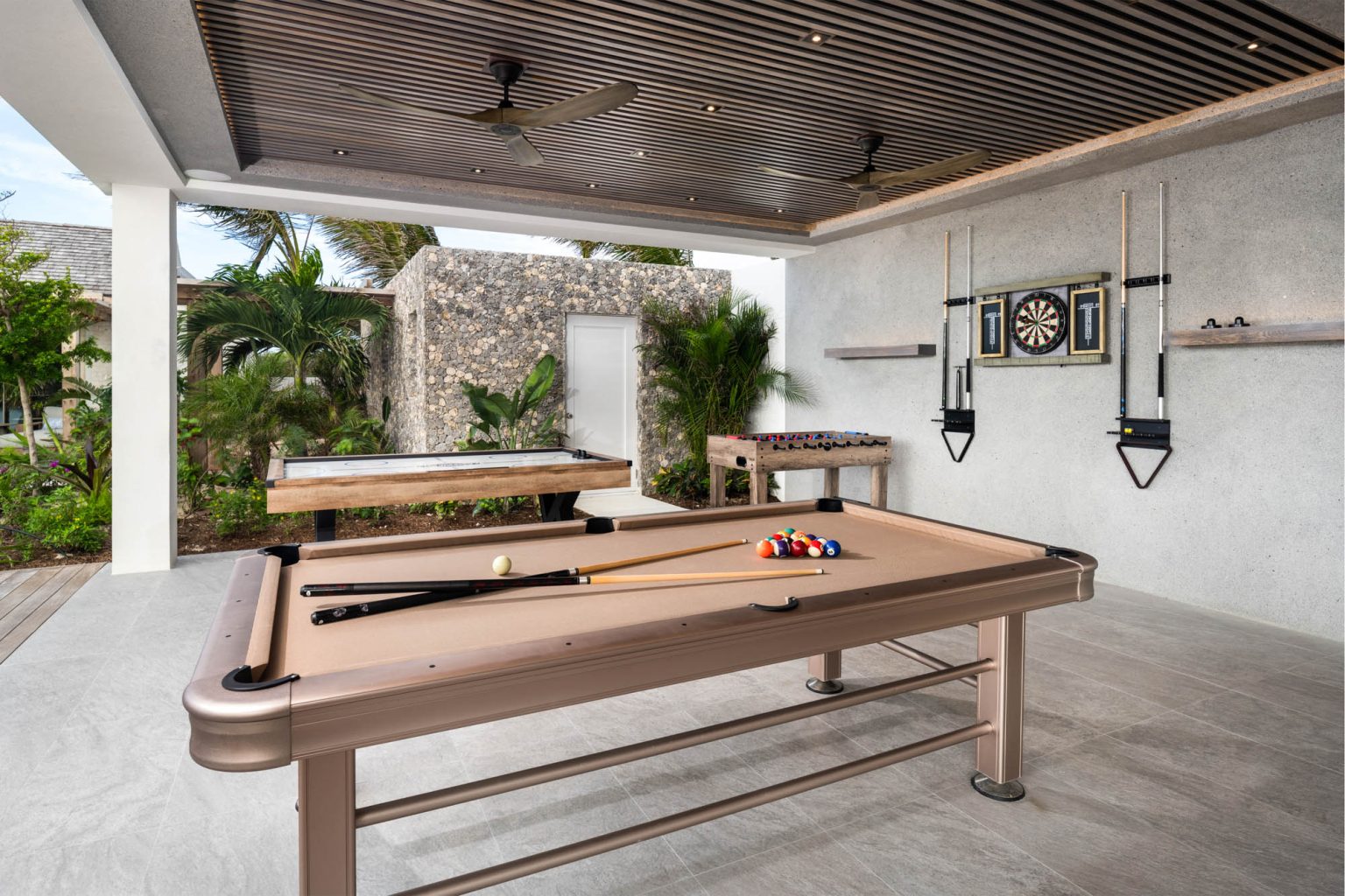 67805a0cb0966477400ed7a9_Ambergris-Cay-Dream-Away-Villa-Game-Area-Turks-and-Caicos
