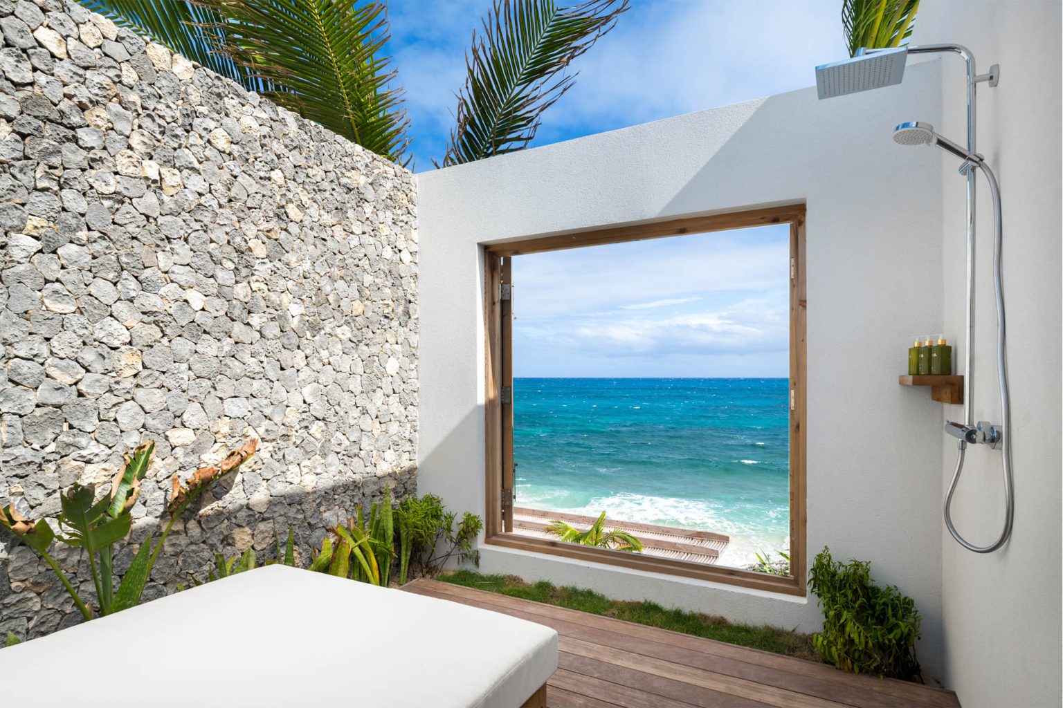 67805a0d0197141d0cae5a53_Ambergris-Cay-Dream-Away-Villa-Bungalow-Outdoor-Shower-Daybed-Turks-and-Caicos