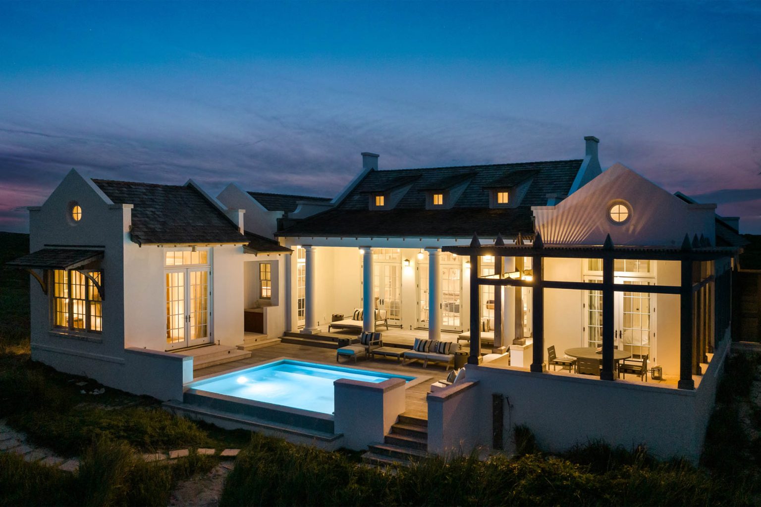 678ae2b0279023b86a8c1521_Ambergris-Cay-Osprey-4-bedroom-villa-sundeck-at-night-Turks-and-Caicos