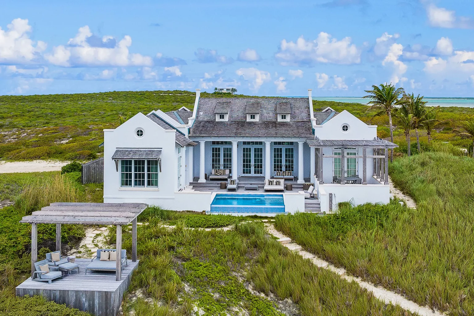 67b4ce2fd407683bafe8b734_10 - Ambergris-Cay-Osprey-4-bedroom-villa-sundeck-Turks-and-Caicos