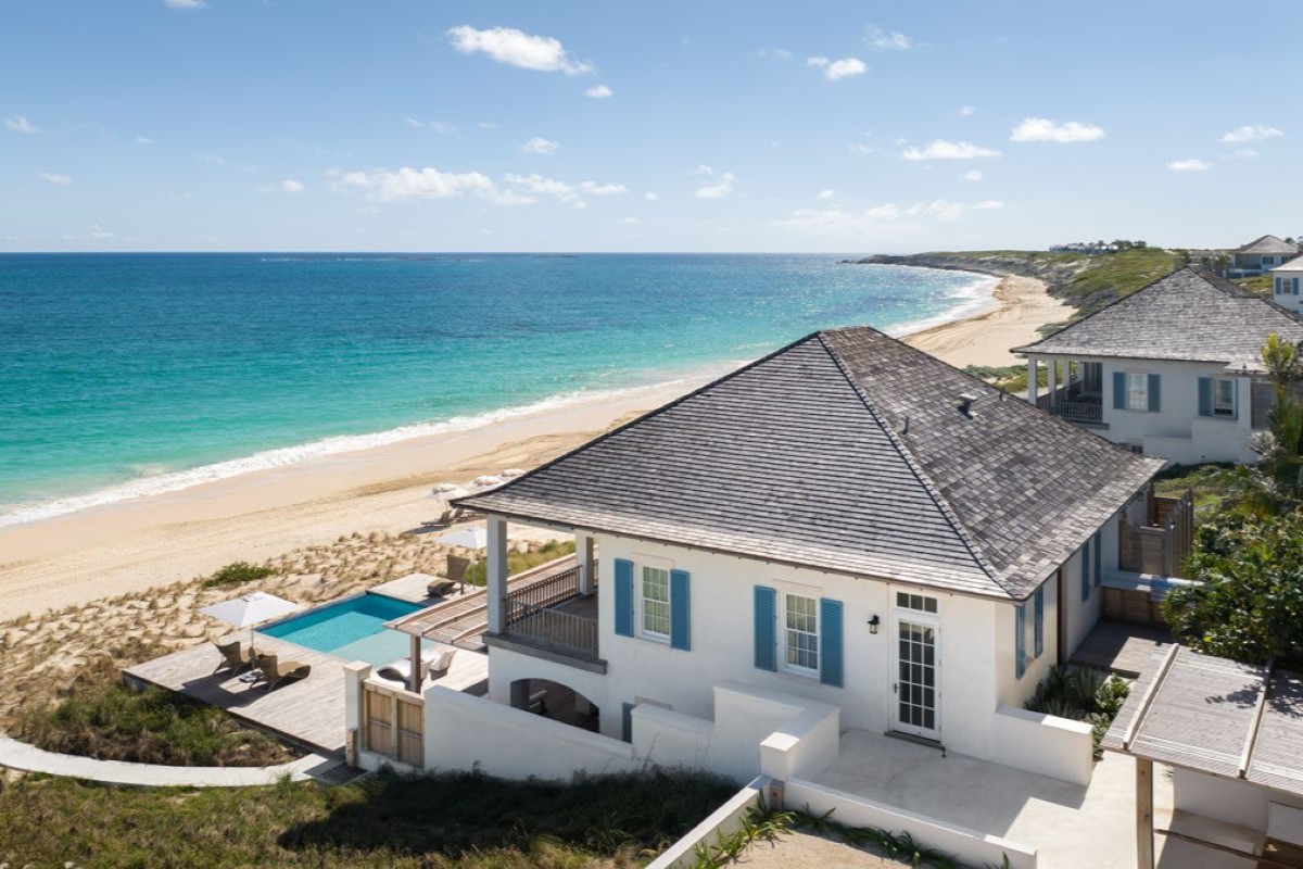 695e76d9ec99043ef9ff00d8_Ambergris-Cay-Olympus-Villa-Side-Aerial_