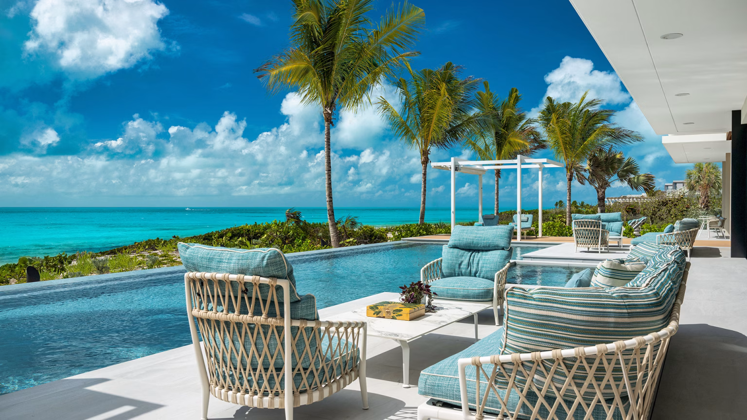 6aa937adb4324528eb1d5f98_IHLVM Villa Paradisa_023 Pool Area Seating